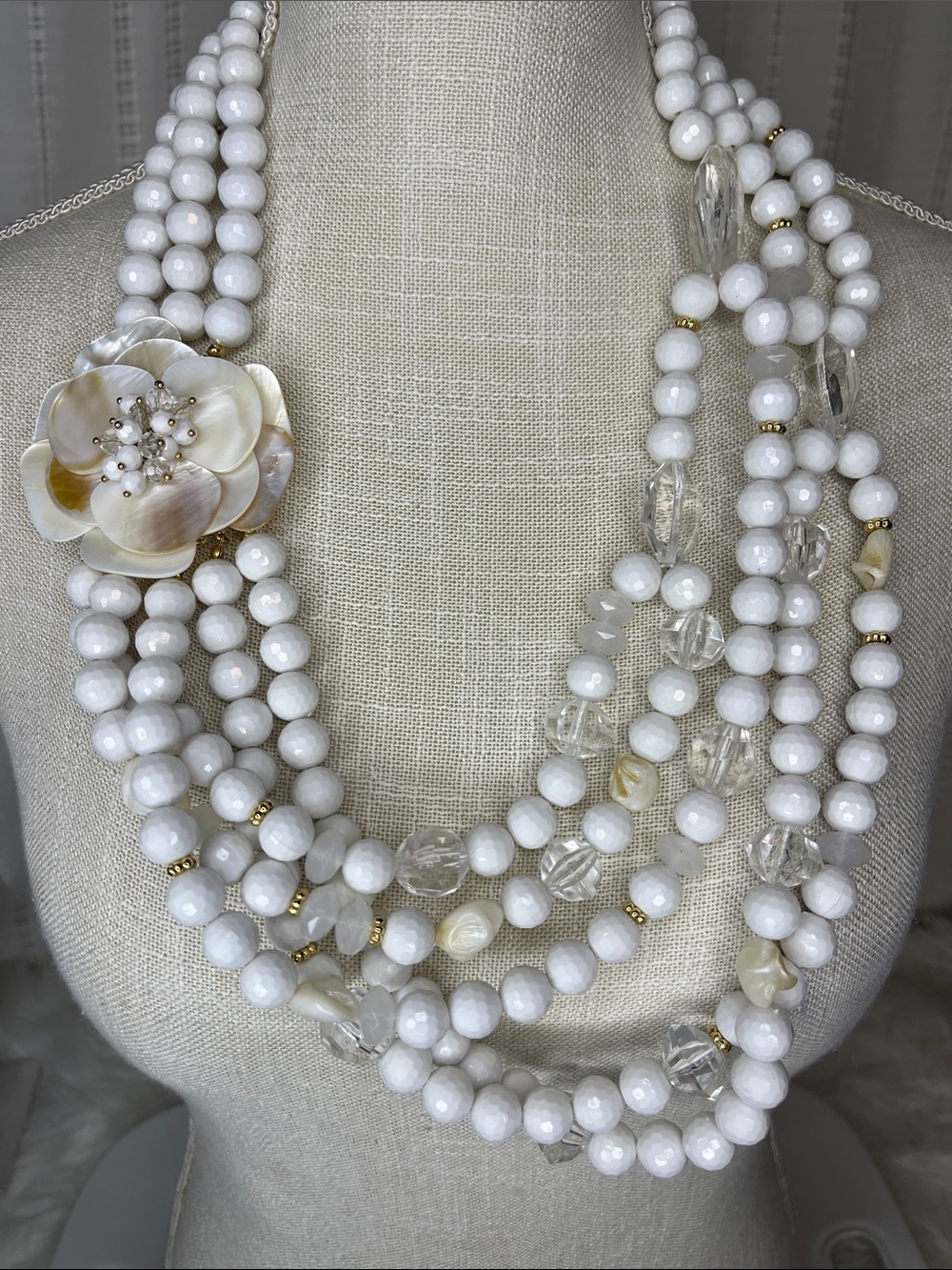 Elegant White Multi-Strand Beaded Necklace with Floral Accent